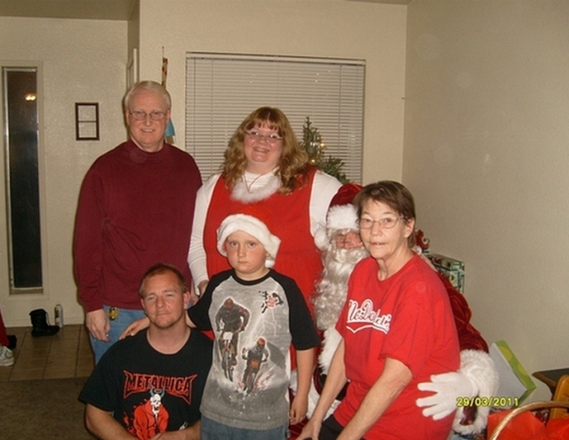 Greg Hinson and family
Top: Greg, Mrs. Claus, Santa Claus, Linda Hinson
Bottom Row: Stepson David Slate and Grandson Kaleb Nix